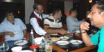 Waiter stealing a papad
